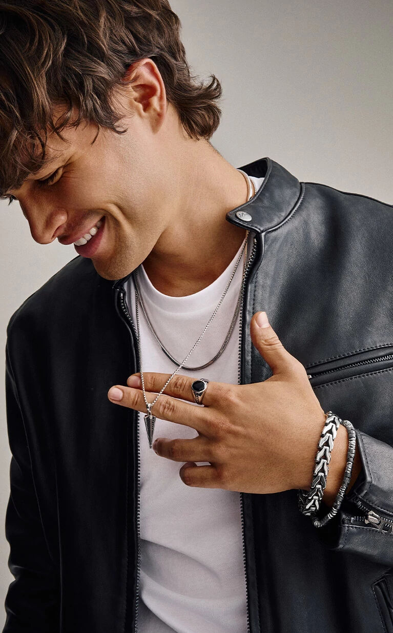 Man and Woman Wearing Bulova Jewelry and Watch