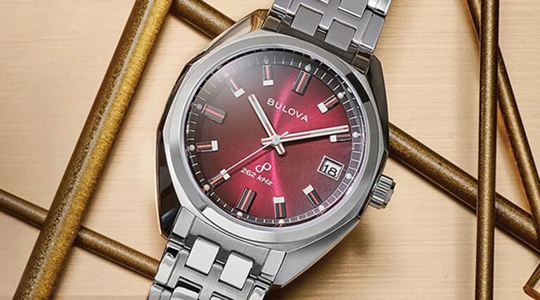 Jet Star Watches; Featuring an image of Jet Star model 96B401 on a gold print background