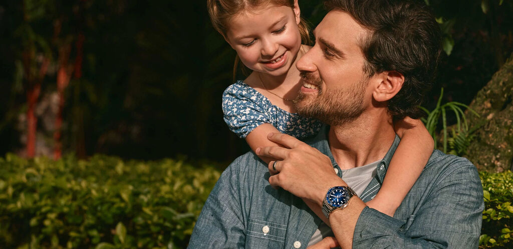 Father's Day Gift Guide; Image of man and daughter wearing Marine Star watch model 98B466