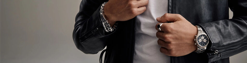 Man in Leather Jacket Wearing Bulova Prestige Watch Paired with Matching Bulova Jewelry