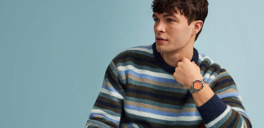 Caravelle; Image of man wearing Caravelle Vintage Sea Hunter watch model 43B177