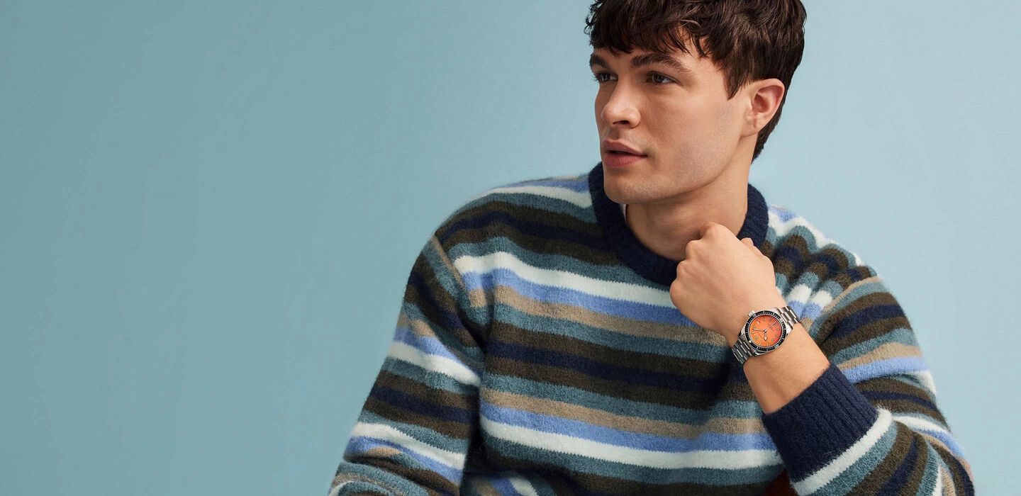 Caravelle; Image of man wearing Caravelle Vintage Sea Hunter watch model 43B177