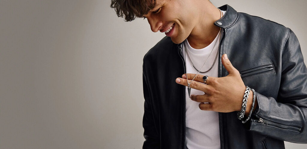 Man and Woman Wearing Bulova Jewelry and Watch