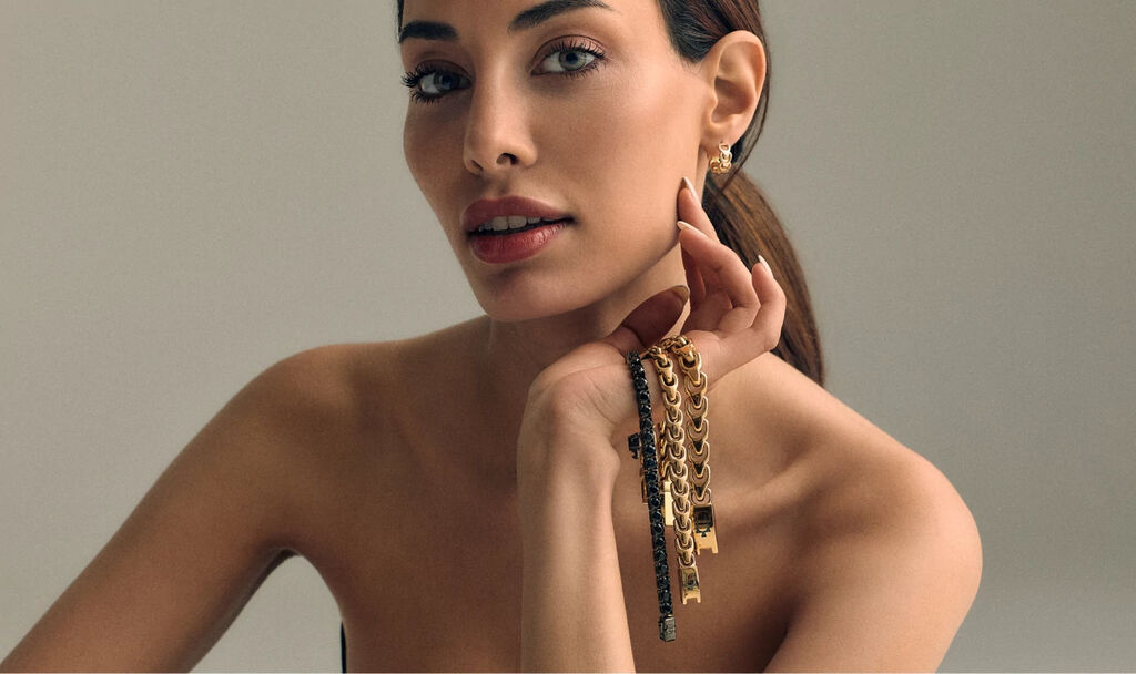 Woman Holding Bulova Link Bracelets