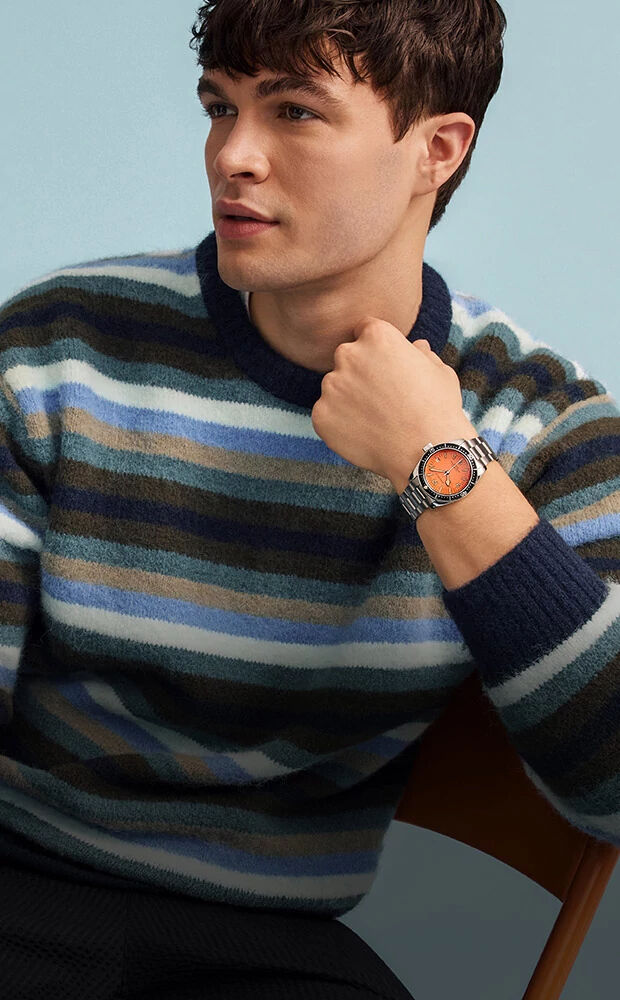 Caravelle; Image of man wearing Caravelle Vintage Sea Hunter watch model 43B177