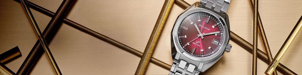 Jet Star Watches; Featuring an image of Jet Star model 96B401 on a gold print background