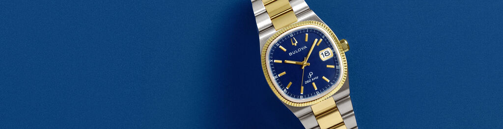 Tabletop Image of Blue Dial Two-Tone Bulova Super Seville Online Exclusive Watch