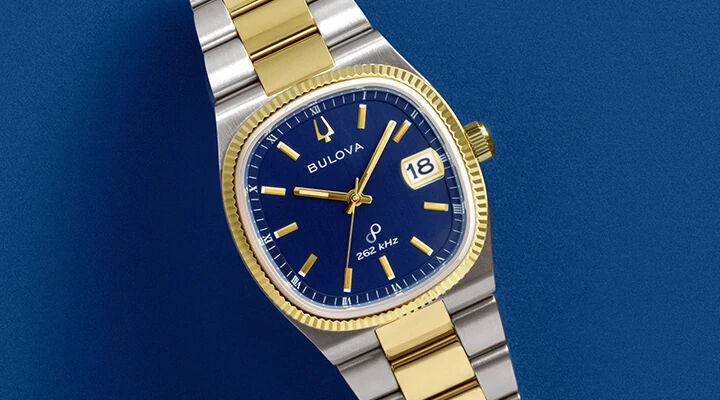 Tabletop Image of Blue Dial Two-Tone Bulova Super Seville Online Exclusive Watch