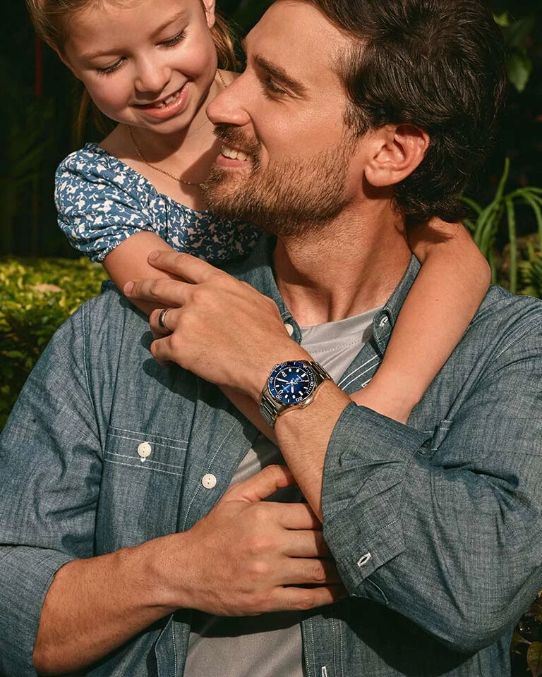 Father's Day Gift Guide; Image of man and daughter wearing Marine Star watch model 98B466