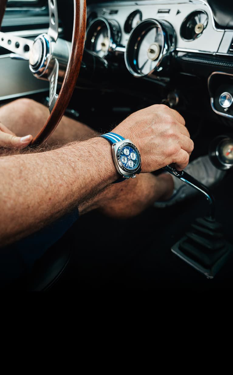 Man wearing the SHELBY&reg; Racer Chronograph watch model 98B452