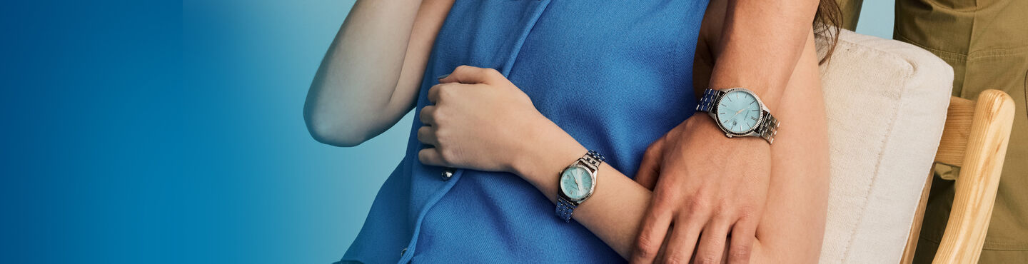 Couple wearing the Caravel watch models 43B174 and 43M124