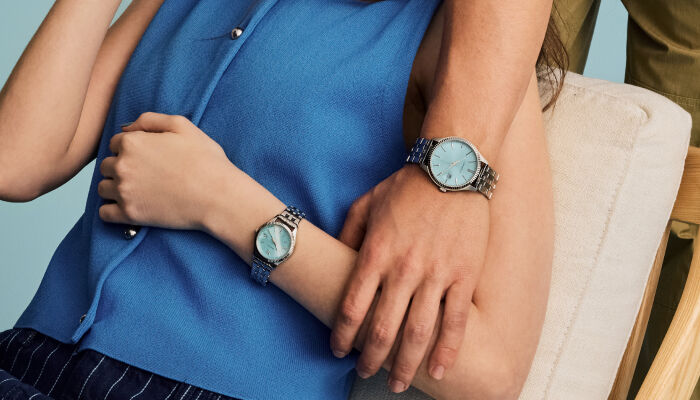 Couple wearing the Caravel watch models 43B174 and 43M124